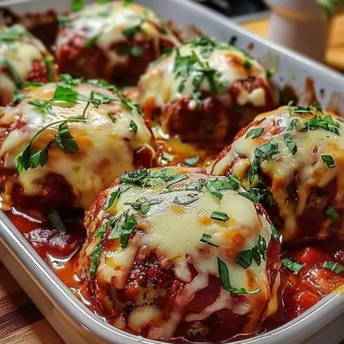Baked mozzarella stuffed meatballs fresh out of the oven