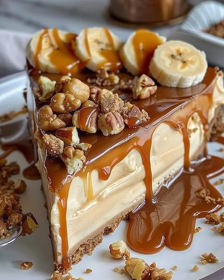 Delicious Caramel Banana Crunch Cheesecake with a crunchy topping