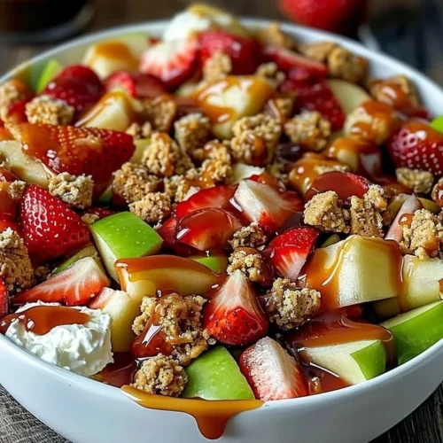 Delicious cheesecake fruit salad with mixed berries and creamy filling