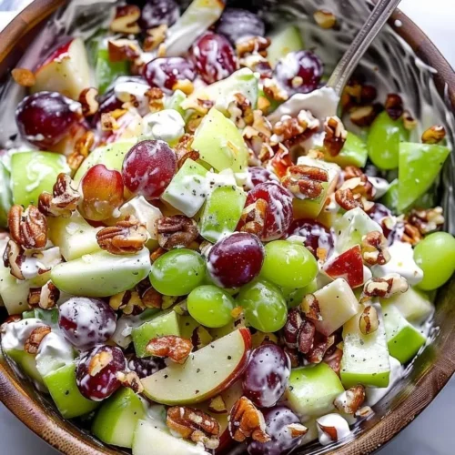 Classic Waldorf Salad with apples, walnuts, and celery in a bowl