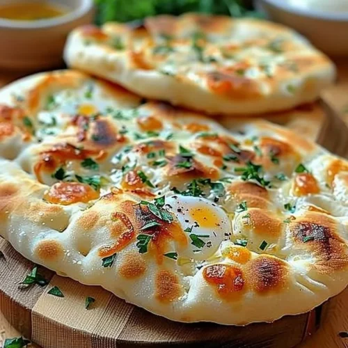 Delicious cottage cheese flatbread topped with herbs and vegetables