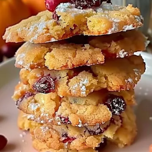 Delicious Cranberry Orange Shortbread cookies on a decorative plate