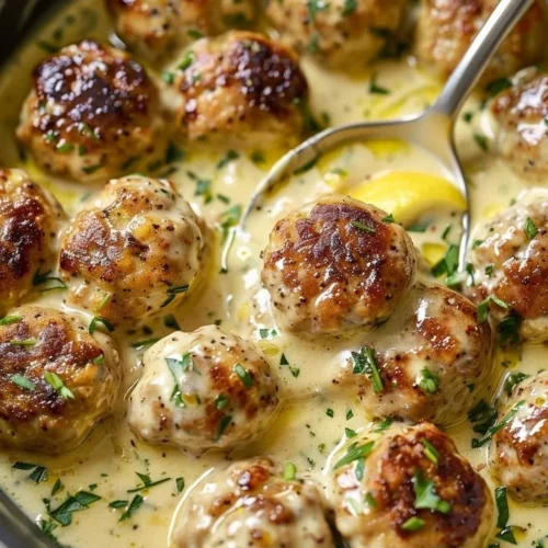 Creamy lemon pepper chicken meatballs served on a plate