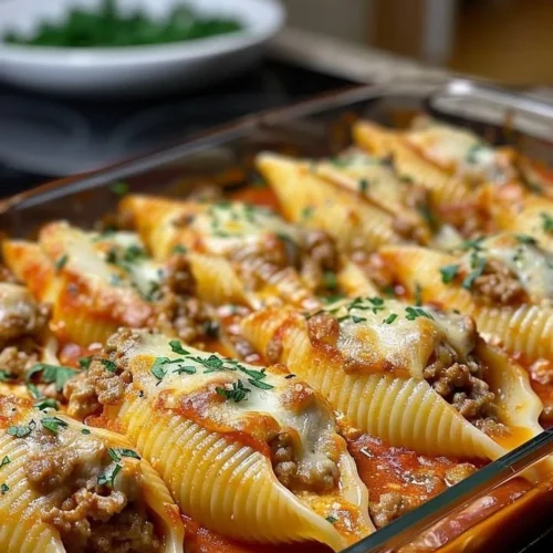 Creamy ricotta beef stuffed shells pasta served in a bowl