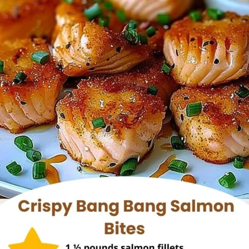 Crispy Bang Bang Salmon Bites served with dipping sauce on a plate.