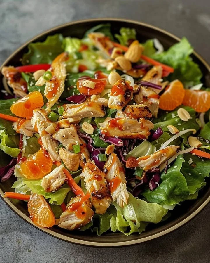 Crunchy Asian Chicken Salad with fresh vegetables and sesame dressing