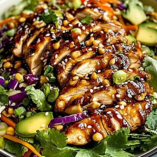 Crunchy Asian Sesame Chicken Salad with fresh ingredients and a tangy dressing