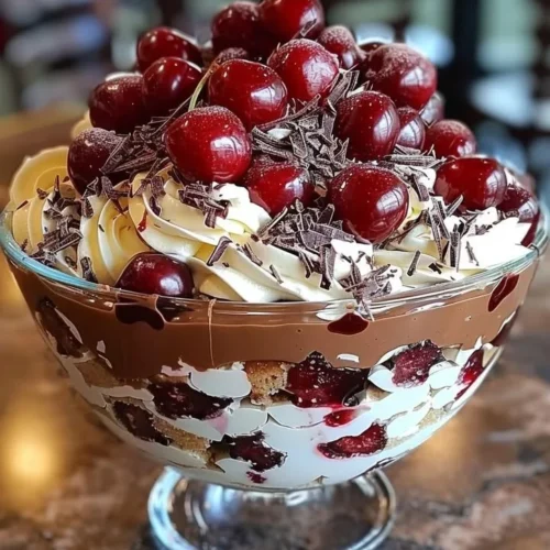 Delicious cherry chocolate trifle dessert with layers of chocolate and cherries