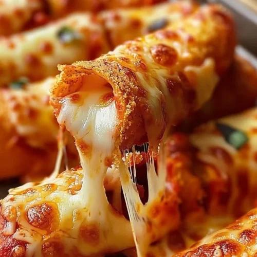 Plate of Doritos Pizza Rolls, crispy snacks filled with pizza flavor.