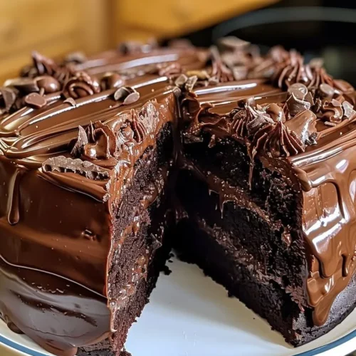 Delicious Double Chocolate Coca-Cola Cake topped with chocolate frosting