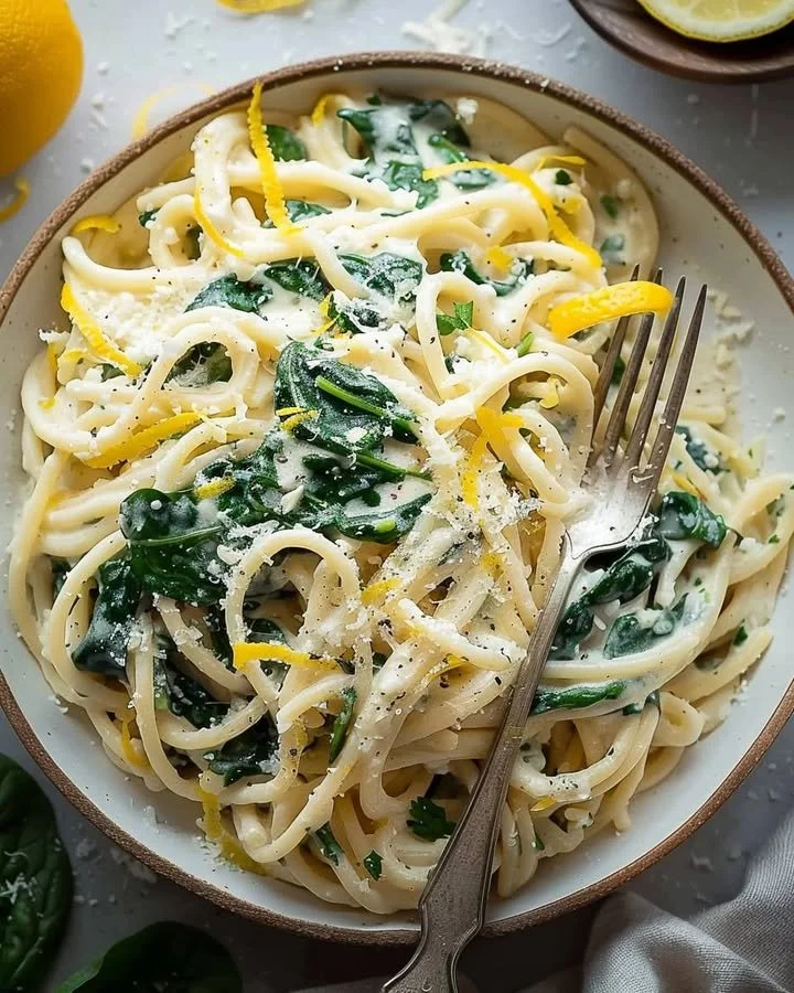 Delicious lemon ricotta pasta with spinach in a bowl