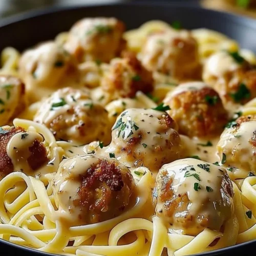 Garlic Butter Chicken Bites served with Creamy Parmesan Pasta dish