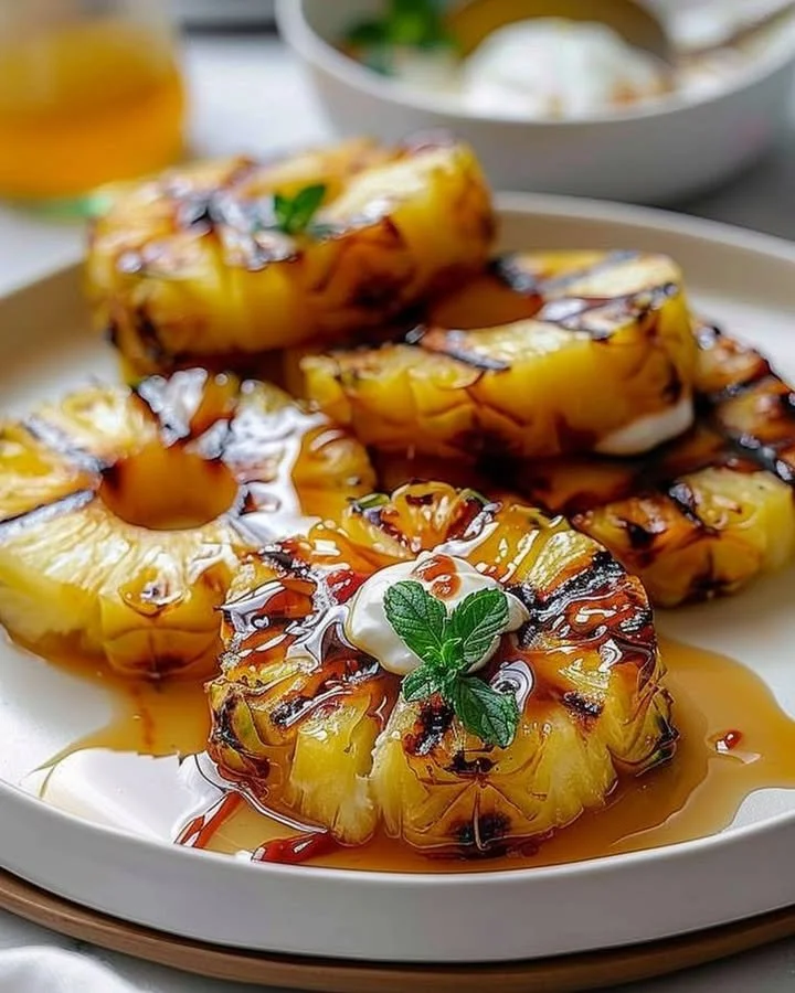 Delicious grilled pineapple slices served on a plate