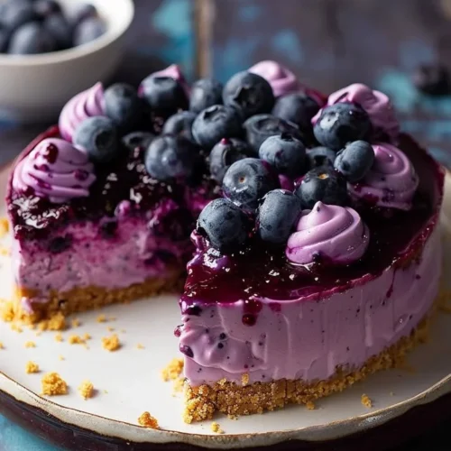 Delicious no-bake blueberry cheesecake topped with fresh blueberries