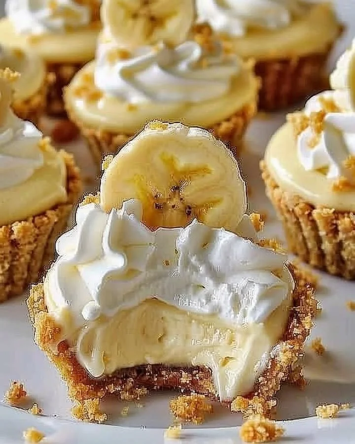 No-Bake Mini Banana Cream Pies topped with whipped cream and bananas
