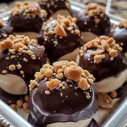 Delicious no-bake peanut butter cheesecake balls on a plate.