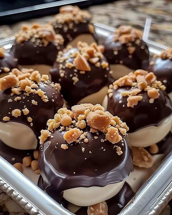 Delicious no-bake peanut butter cheesecake balls on a plate.