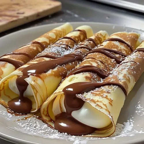 Delicious Nutella crepes filled with creamy chocolate hazelnut spread
