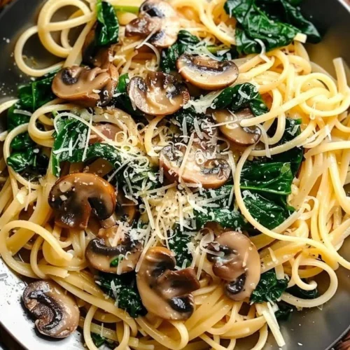 One Pot Garlic Parmesan Pasta with herbs and cheese in a bowl