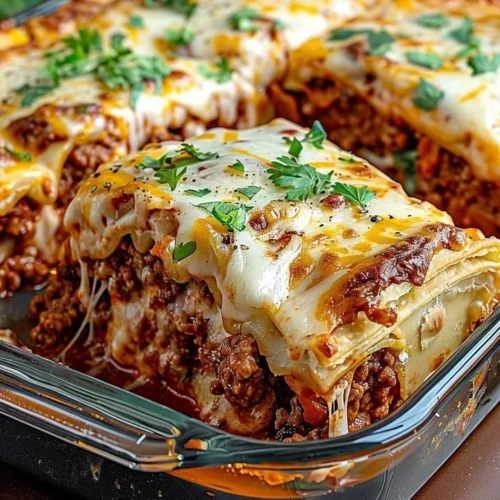 Delicious Crescent Roll Taco Bake topped with cheese and spices