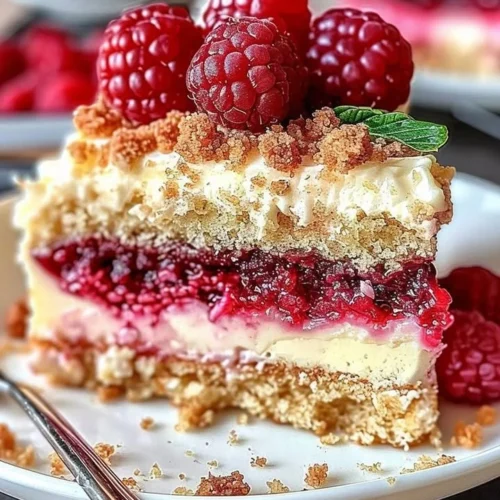 Delicious Raspberry Cream Cheese Coffee Cake served on a plate