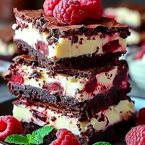 Deliciously rich Red Velvet Brownies topped with cream cheese frosting