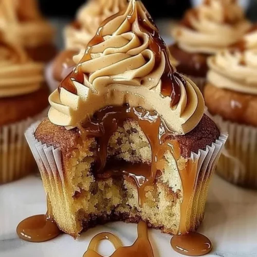 Delicious Salted Caramel Cupcakes with rich frosting and a sprinkle of sea salt