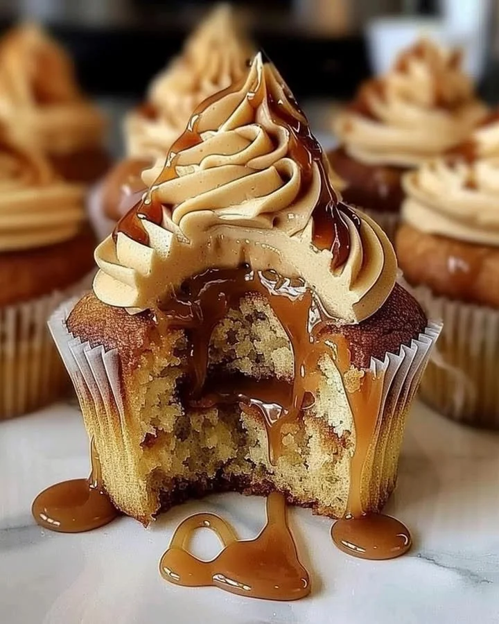 Delicious Salted Caramel Cupcakes with rich frosting and a sprinkle of sea salt