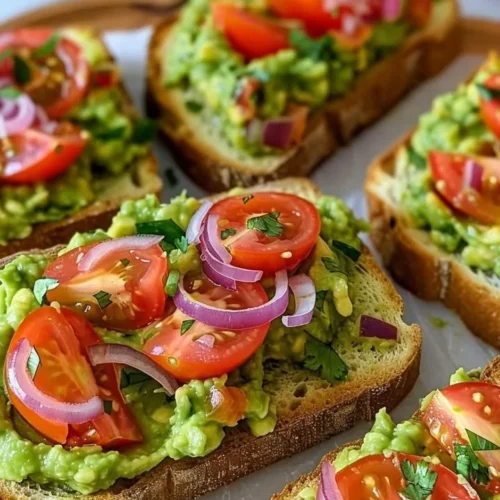 Smashed avocado bruschetta served on toasted bread