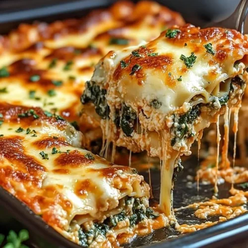 Spinach lasagna with ricotta and three cheeses baked to perfection