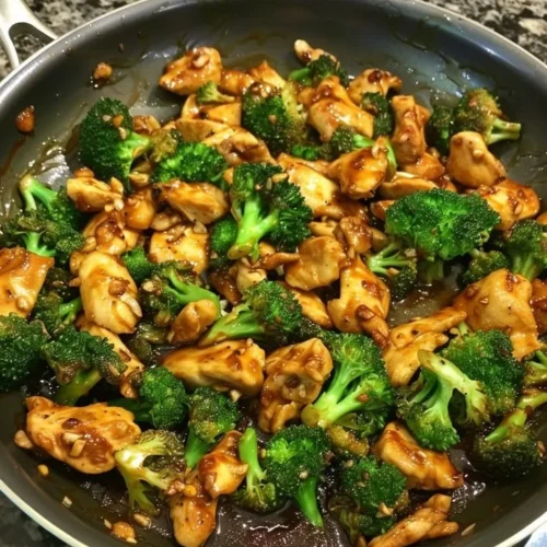 Szechuan-Style Chicken with Broccoli served on a plate