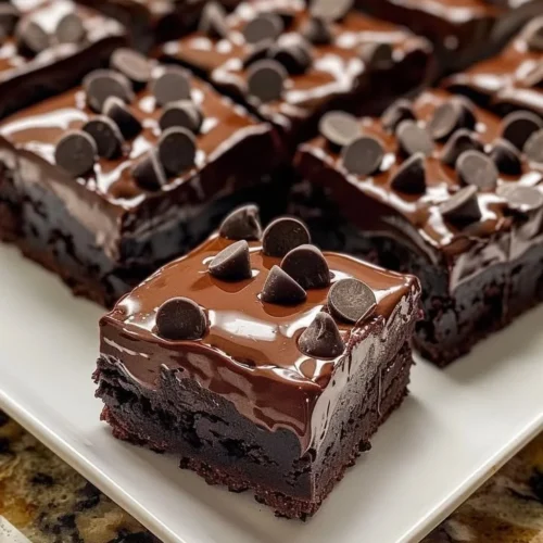 Triple chocolate fudge brownies with a rich and gooey texture